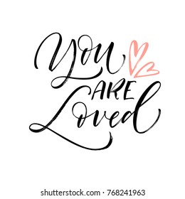 You are loved phrase with hearts. Romantic lettering. Ink illustration. Modern brush calligraphy. Isolated on white background. 