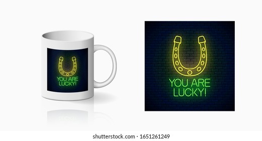 You are lucky - glowing neon inscription phrase with horseshoe sign print for cup design. Motivation quote in neon style mug mockup. Vector illustration
