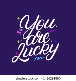 You are Lucky hand written lettering. Modern calligraphy quote, phrase. Vector Illustration.