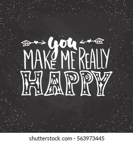 You make me really happy- lettering Valentines Day calligraphy phrase isolated on the background. Fun brush ink typography for photo overlays, t-shirt print, poster design