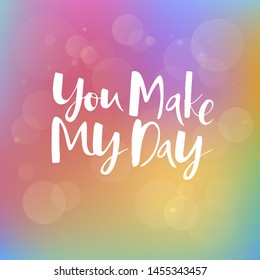 You make my day lettering.  Handwritten white text on the blurred colorful background. Vector illustration. Inspiring phrase of the day.