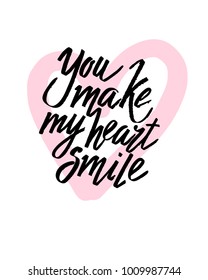 You make my heart smile Valentines day calligraphy card. Hand drawn design elements. Handwritten modern brush lettering.