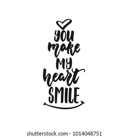 You make my heart smile - hand drawn lettering phrase isolated on the white background. Fun brush ink inscription for photo overlays, greeting card or print, poster design