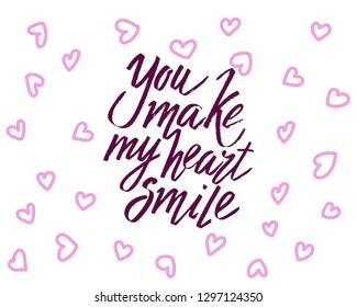 You make my heart smile, hand written lettering. Romantic love calligraphy card inscription Valentine day