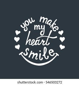 You make my heart smile lettering. Romantic quote about love. Modern calligraphy phrase with hand drawn hearts. Valentine's day greeting card. Typography poster design for him and here.