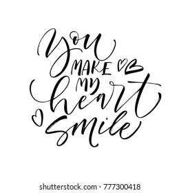 You make my heart smile phrase. Ink illustration. Modern brush calligraphy. Isolated on white background.