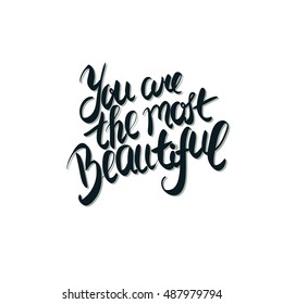 you are the most beautiful card. Modern brush calligraphy. Vector lettering art. Hand drawn lettering phrase. Ink illustration. Isolated on white background. Grunge colored background. 