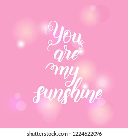 You are my sunshine - Hand made inspirational and motivational quote on pink background. Lettering calligraphy phrase. Happy Valentine's Day.