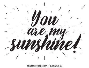 You are my sunshine inscription. Greeting card with calligraphy. Hand drawn lettering design. Photo overlay. Typography for banner, poster or apparel design. Vector typography.