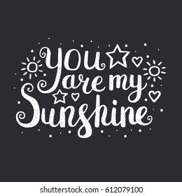 You are my sunshine. Vector hand drawn lettering quote for cards, T shirts, labels, posters. Inspirational romantic quote. Isolated. On black background.