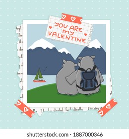 You are my Valentine text is on piece of paper in squares with dots and part of newspaper. Washi tape is on the top, photo of hippo couple in mountains is on the bottom. Blue patterned background