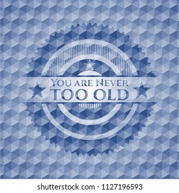 You are Never too old blue badge with geometric background.