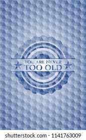 You are Never too old blue badge with geometric background.