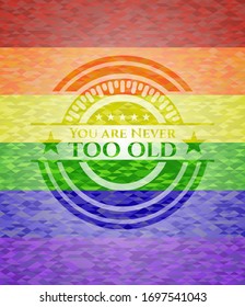 You are Never too old emblem on mosaic background with the colors of the LGBT flag