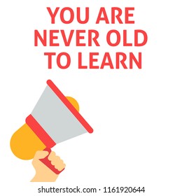 YOU ARE NEVER OLD TO LEARN Announcement. Hand Holding Megaphone With Speech Bubble. Flat Vector Illustration