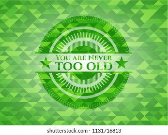 You are Never too old realistic green emblem. Mosaic background