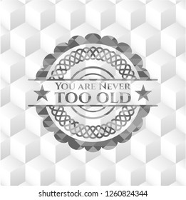 You are Never too old realistic grey emblem with geometric cube white background
