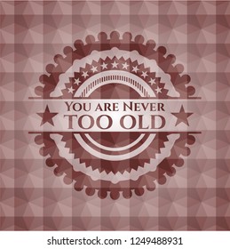 You are Never too old red geometric pattern emblem. Seamless.