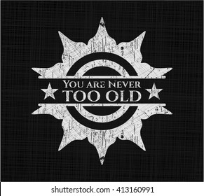 You are Never too old written with chalkboard texture