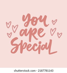 You are special - handwritten quote with hearts. Modern calligraphy illustration.