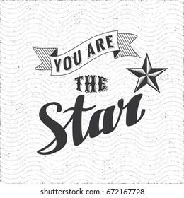 You Are the Star Calligraphic Hand Drawn Logo Lettering with Engraved Star Pentagon and Vintage Ribbon - Pale Black Elements on White Grunge Wavy Background - Vector Contrast Graphic Design