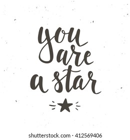 You are a star. Hand drawn typography poster. T shirt hand lettered calligraphic design. Inspirational vector typography