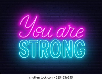 You are strong neon sign on brick wall background.