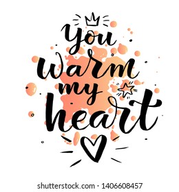 ''You warm my heart'' lettering typography poster. Handdrawn heart, crown and star. Motivational phrase for Valentine's day card, gift  packaging. Vector illustration on watercolor splash background.