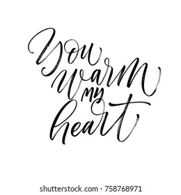 You warm my heart phrase. Romantic lettering. Quote for Valentine's day. Ink illustration. Modern brush calligraphy. Isolated on white background.