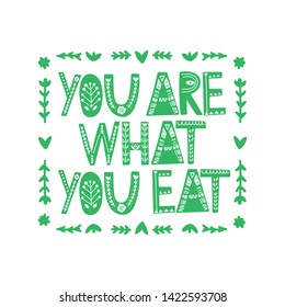 You are what you eat. Hand drawn vector lettering. Quote about healthy eating. For poster, t shirt, postcard etc.
