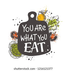 You are what you eat. Lettering. Hand drawn vector illustration. Can be used for badges, labels, logo, bakery, street festival, farmers market, country fair, shop, kitchen classes, cafe, food studio.