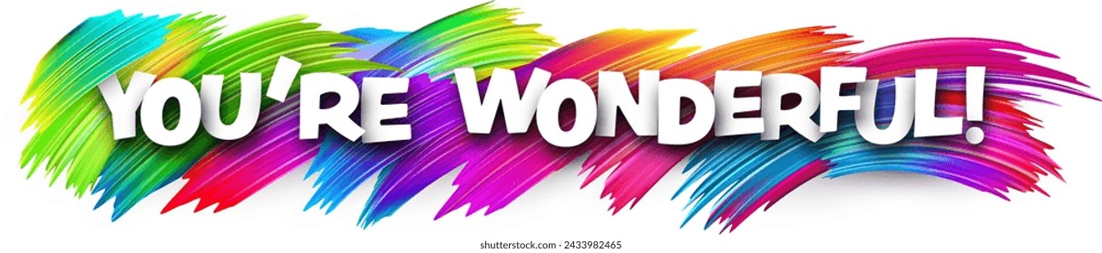 You are wonderful paper word sign with colorful spectrum paint brush strokes over white. Vector illustration.