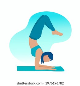 A young, active, attractive girl is doing yoga on a mat. Ganda Bherundasana pose. Meditation, stretching, healthy lifestyle.