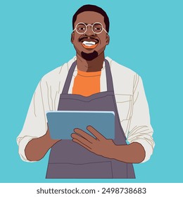 A young African American businessman checking his ipad wearing an apron smiling