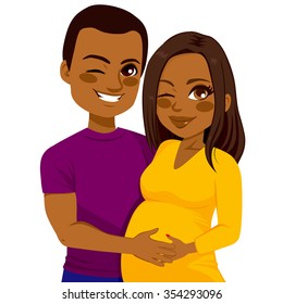 Young African American couple of man touching his pregnant wife belly expecting baby