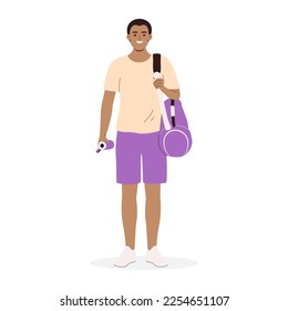 Young African American man holding gym bag and bottle of water