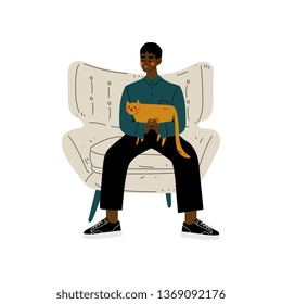 Young African American Man Sitting in Armchair with Cat in His Hands, Guy Spending Weekend at Home and Relaxing, Rest at Home Vector Illustration