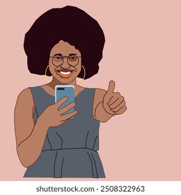 Una joven afroamericana sonriendo con los pulgares hacia arriba sosteniendo un teléfono celular con gafas negras