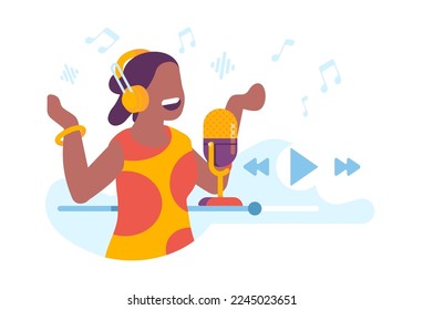 Young African American woman wearing headphones sings in recording studio. Headset and microphone. Audio player. Music broadcasting. Multimedia equipment. Online