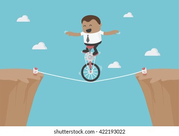 Young African businessman balancing on the rope 