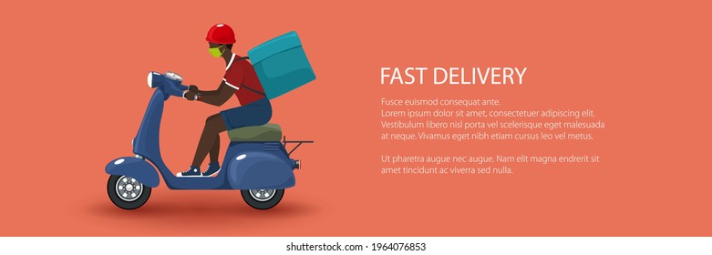 Young african guy in protective face mask with box for food delivery rides a scooter, blue vintage scooter isolated on orange background, banner of online delivery service and stay home concept