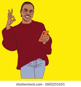 young African lady doing a okay sign smiling while holding a cell phone