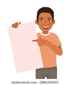 Young African man holding blank billboard pointing index finger to empty banner for copyspace advertising and announcement messages