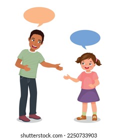 Young African man talking to cute little girl having conversation with speech bubbles