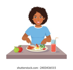 Young African woman eating sausage eggs and vegetables for breakfast