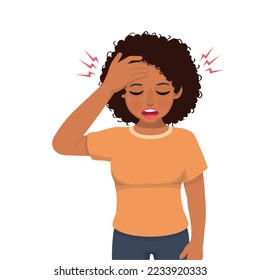 young African woman having a headache with hand squeezing her head because of stress, migraine, and having worries or anxiety problems