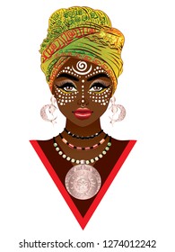 Young african woman wears turban with tribal voodoo makeup.