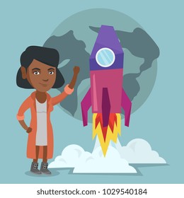 Young african-american business woman with raised arm standing on the background of rocket and earth planet symbolizing launching a new business project. Vector cartoon illustration. Square layout.