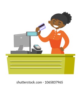 Young african-american cashier holding credit card at the checkout in supermarket. Female cashier working at the cash register. Vector cartoon illustration isolated on white background. Square layout.