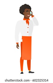 Young african-american chef cook in uniform talking on a mobile phone. Smiling chef cook talking on a cell phone. Chef using cell phone. Vector flat design illustration isolated on white background.